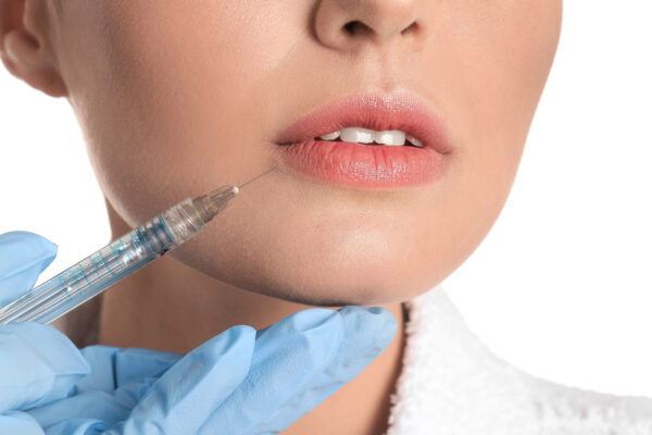Injectable Botox has been used as a short-term solution for gum exposure.