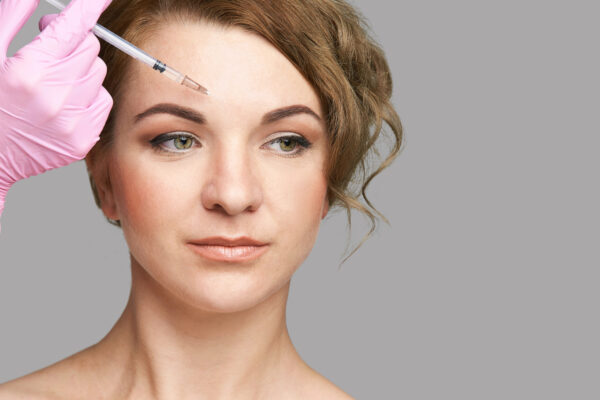Botox reduces wrinkles on the forehead, frown lines, and crow's feet by relaxing these overactive muscles.